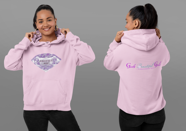 Latina woman wearing a pink hoodie with a Purple Diamond on the front with the words "Wonderfully Made" in the center of the diamond.  The back of the hoodie has the words "God's Beautiful Girls" in purple and turquoise
